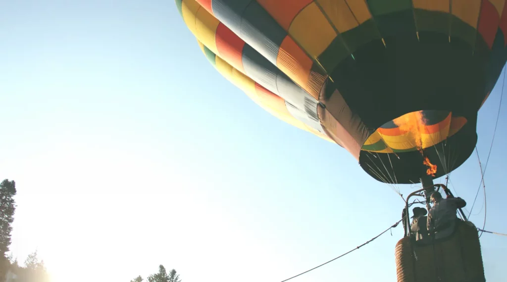 person riding on hot air balloon