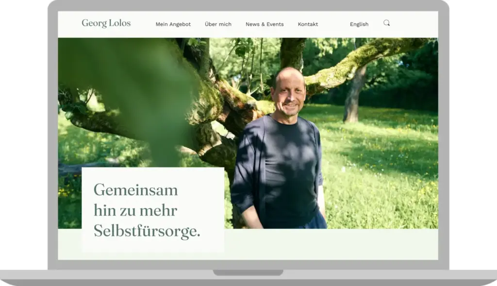 Homepage in Laptop-Ansicht